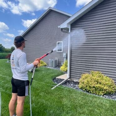 Prime & Shine carrying out a Soft Washing Service on a home