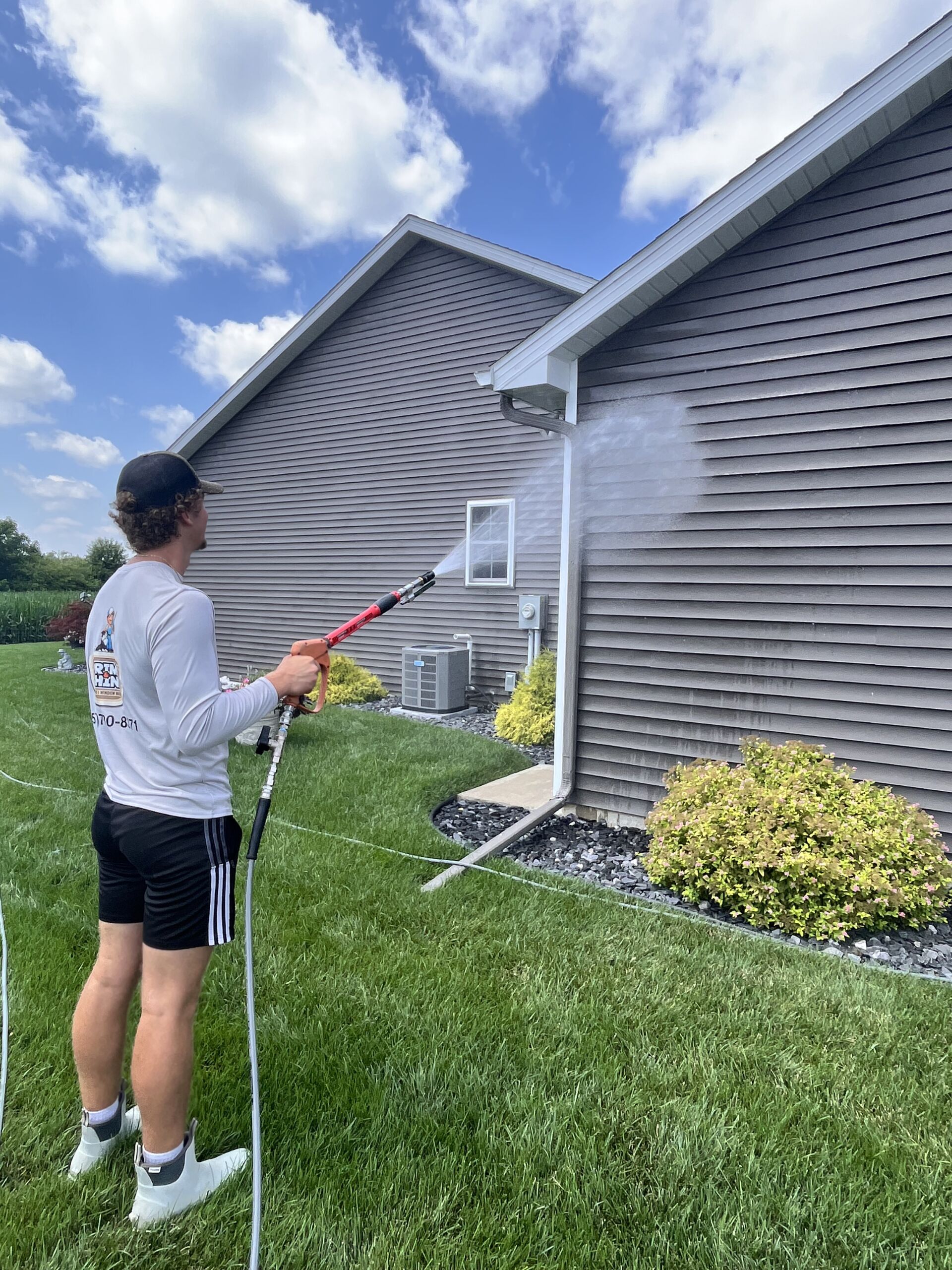 Prime & Shine carrying out a Soft Washing Service on a home